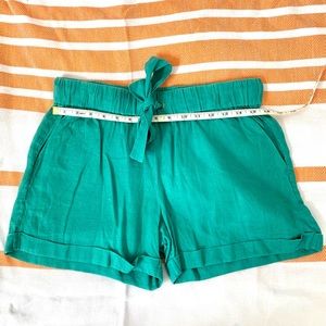 Size 4 Jcrew teal linen cuffed shorts. 4 inch inseam. Tie waist.